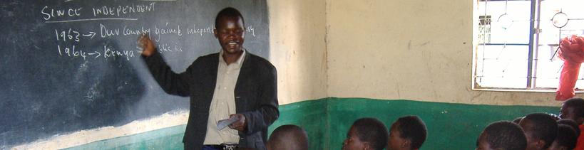 Teacher instructing students in Kenya